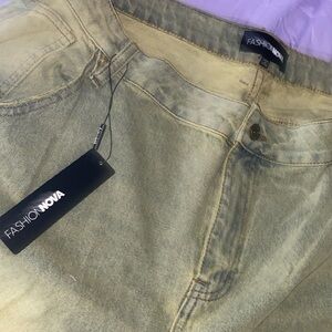 Tan/green dusty denim jeans